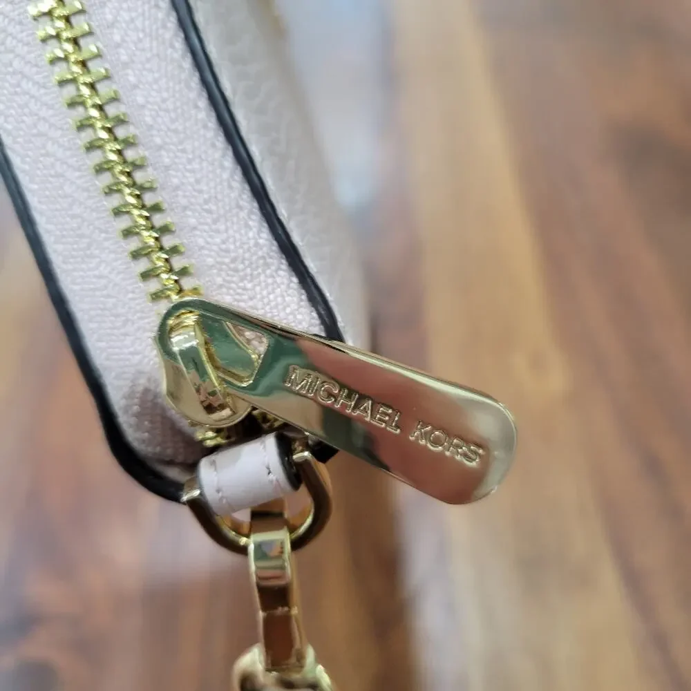 Michael Kors Jet Set Continental Wristlet in Pebbled Leather